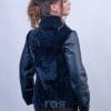 Къс втален дамски кожух от ГОЯ Leather. Стилен, елегантен модел, подходящ за ежедневно носене с всякакъв тип дрехи - от спортни джинси до делово облекло. Предната част се отваря на ревер. Ръкавите - горната част е с покритие, а вътре с мек косъм на тула. Лек, удобен, топъл и комфортен модел.