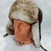 Кожена шапка ушанка от ГОЯ Leather. Изработена от агнешка напа в комбинация с агнешка тула. Моделът е подходящ и за мъже, и за жени.