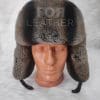Кожена шапка ушанка от ГОЯ Leather. Шапка изработена от 100% естествена кожа. Използваните естествени материали са агнешка напа и рекс-чинчила. Лек, топъл и комфортен модел. Шапката е унисекс.