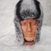 Кожена шапка ушанка от ГОЯ Leather. Шапка изработена от 100% естествена кожа. Използваните естествени материали са агнешка напа и рекс-чинчила. Лек, топъл и комфортен модел. Шапката е унисекс.