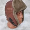 Кожена шапка ушанка от ГОЯ Leather. Моделът е изработен от агнешка лицева кожа и агнешка тула. 100% естествена кожа. Зимна шапка с ватиран хастар.