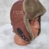 Кожена шапка ушанка от ГОЯ Leather. Моделът е изработен от агнешка лицева кожа и агнешка тула. 100% естествена кожа. Зимна шапка с ватиран хастар.
