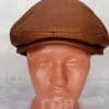 Кожен каскет от ГОЯ Leather. Кожен каскет в камел цвят , изработен от агнешка тула с покритие напалан. Класически модел, подходящ за носене от мъже и жени.