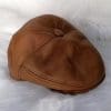 Кожен каскет от ГОЯ Leather. Кожен каскет в камел цвят , изработен от агнешка тула с покритие напалан. Класически модел, подходящ за носене от мъже и жени.